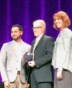 Hal accepts MN Nonprofit Excellence Award